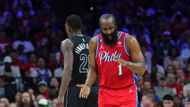 Sixers PG James Harden reacts in front of Nets F Dorian Finney-Smith during the Eastern Conference First Round Playoffs at the Wells Fargo Center in Philadelphia.