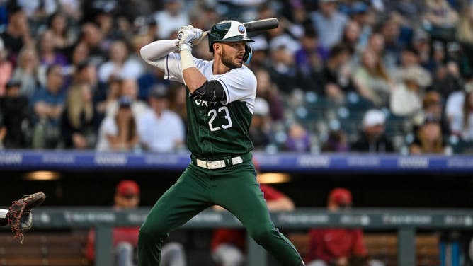 Rockies' Kris Bryant bats in the 3rd inning vs. the Diamondbacks at Coors Field.