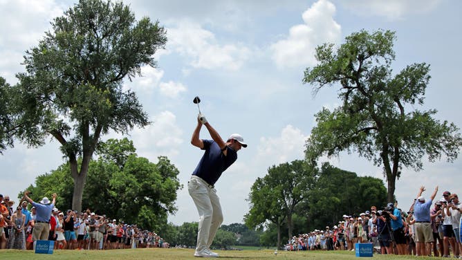 Scottie Scheffler of the United States hits his first shot on the 6th hole during the final round of the Charles Schwab Challenge at Colonial Country Club on May 28, 2023 in Fort Worth, Texas.