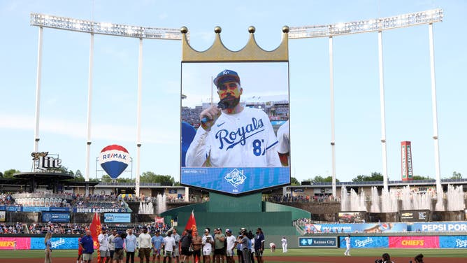 Travis Kelce speaks to the crowd as the Super Bowl-winning Kansas City Chiefs are honored prior to the game between the Cincinnati Reds and the Kansas City Royals at Kauffman Stadium on June 12, 2023 in Kansas City, Missouri.