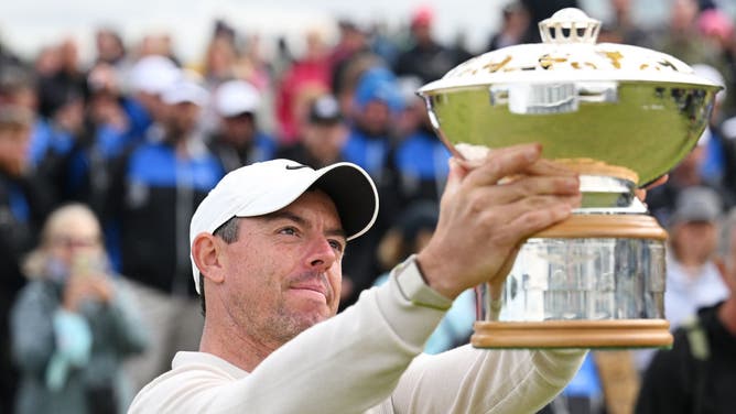 Rory McIlroy poses for a photo with the Genesis Scottish Open trophy at The Renaissance Club after winning the golf tournament.