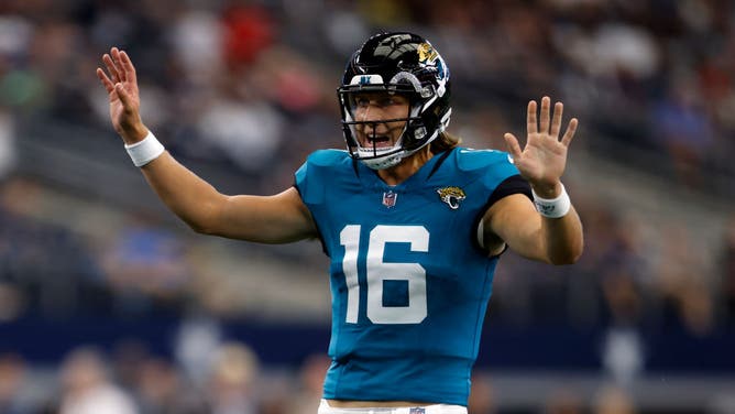 Jaguars QB Trevor Lawrence calls a play vs. the Dallas Cowboys at AT&T Stadium in Arlington, Texas.