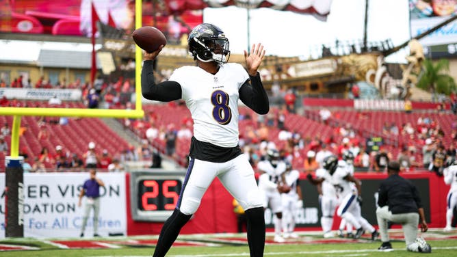 Baltimore Ravens QB Lamar Jackson warms up prior to an NFL preseason football game vs. the Buccaneers at Raymond James Stadium in Tampa Bay, Florida.