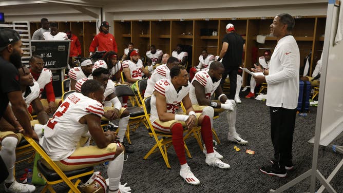 Defensive Coordinator Steve Wilks of the San Francisco 49ers talks to the defense in the locker room.