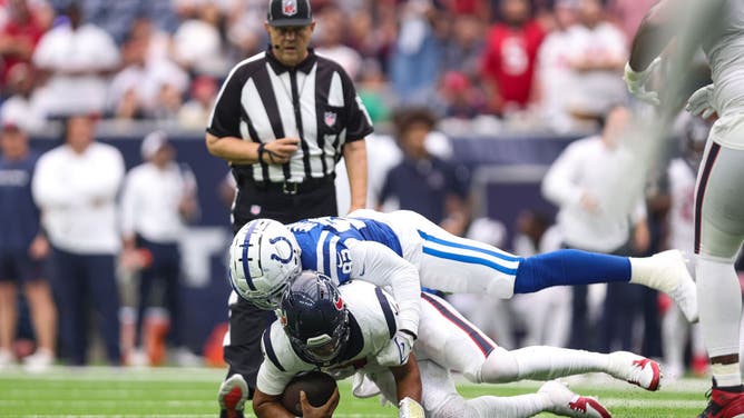 Indianapolis Colts DE Jacob Martin sacks Texans QB C.J. Stroud at NRG Stadium in NFL Week 2.