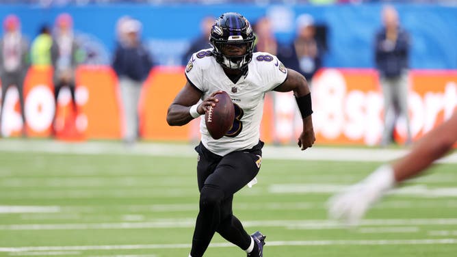 Baltimore Ravens QB Lamar Jackson scrambles against the Tennessee Titans at Tottenham Hotspur Stadium in London.