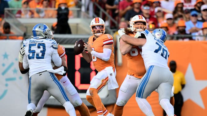 Buccaneers QB Baker Mayfield drops back to pass against the Detroit Lions at Raymond James Stadium in Tampa Bay, Florida.