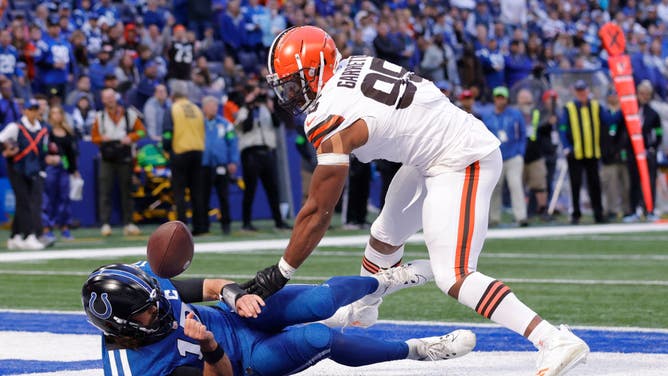 Browns pass rusher Myles Garrett gets a strip-sack fumble on Colts QB Gardner Minshew at Lucas Oil Stadium.