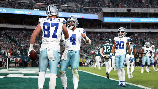 Dallas Cowboys TE Jake Ferguson and Dak Prescott celebrate a TD vs. the Eagles at Lincoln Financial Field in Philadelphia.