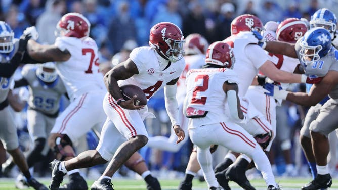 Alabama Crimson Tide QB Jalen Milroe scrambles around vs. the Wildcats at Kroger Field in Lexington, Kentucky.