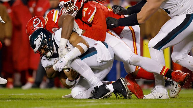Philadelphia Eagles QB Jalen Hurts is sacked by Chiefs pass rusher Chris Jones at GEHA Field at Arrowhead Stadium in Kansas City, Missouri.