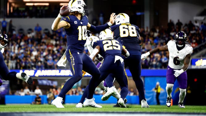 Los Angeles Chargers QB Justin Herbert throws a pass against the Baltimore Ravens at SoFi Stadium in Inglewood, California.