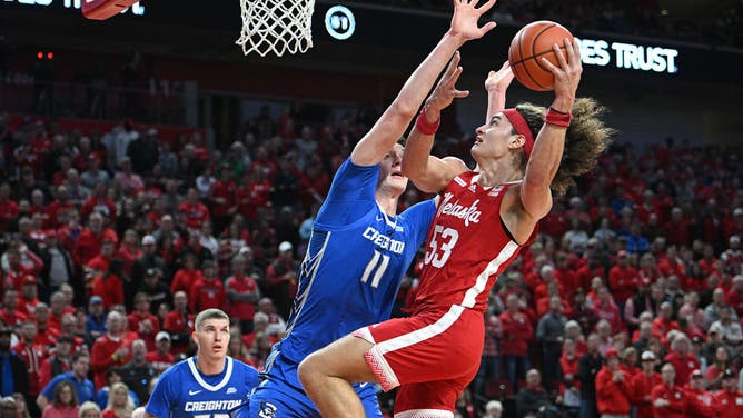 Creighton Bluejays center Ryan Kalkbrenner stuffs Cornhuskers forward Josiah Allick at the basket in Pinnacle Bank Arena in Lincoln, Nebraska.