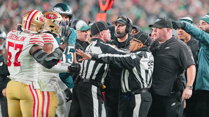 Eagles sideline explodes as Dom DiSandro and 49ers linebacker Dre Greenlaw face off.