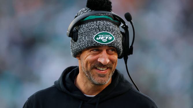 Quarterback Aaron Rodgers of the New York Jets on the sidelines during a football game against the Miami Dolphins at MetLife Stadium.