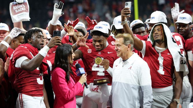 Nick Saban and Alabama Crimson Tide QB Jalen Milroe celebrate a win over Georgia in the 2023 SEC Championship at Mercedes-Benz Stadium in Atlanta.