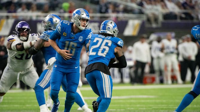 Detroit Lions QB Jared Goff hands the ball off to RB Jahmyr Gibbs vs. the Minnesota Vikings at U.S. Bank Stadium in Minneapolis.