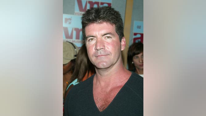 Simon Cowell has a new face.