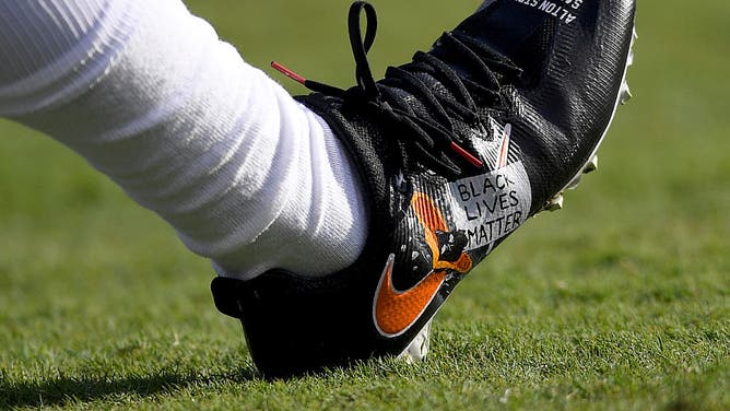A detailed view of the special cleats with the words