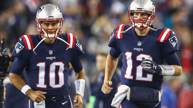 Jimmy Garoppolo and Tom Brady with the New England Patriots.