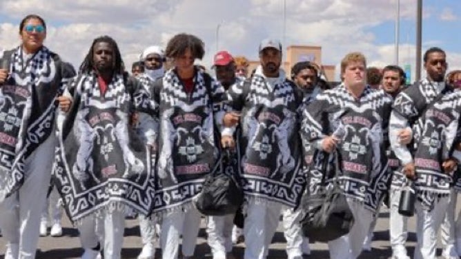 New Mexico State players and coaches all wore a serape during the pregame stadium walk.
Courtesy of New Mexico State