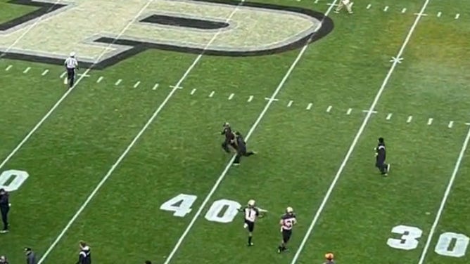 Foot race to save Purdue train.