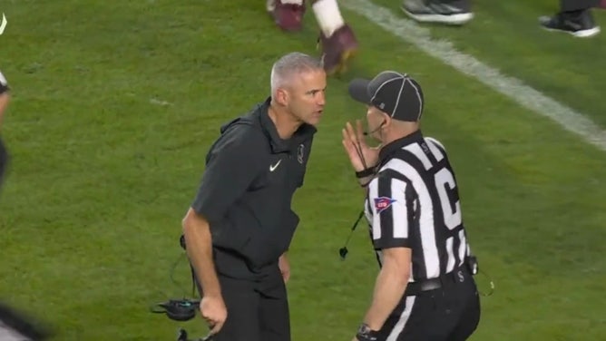 Florida State head coach Mike Norvell reads the referee the riot act after a horrendous call against Florida