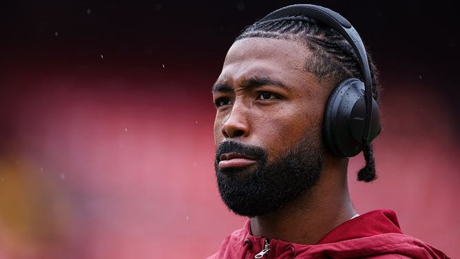 Kendall Fuller looks on
