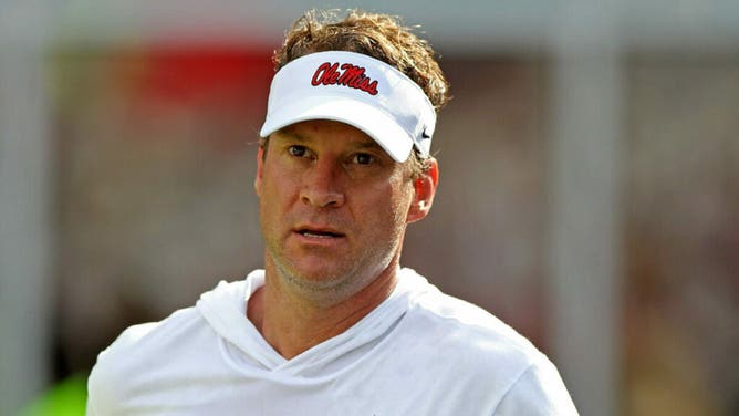 Ole Miss football coach Lane Kiffin reportedly tells players he's not leaving. (Photo by Justin Ford/Getty Images)