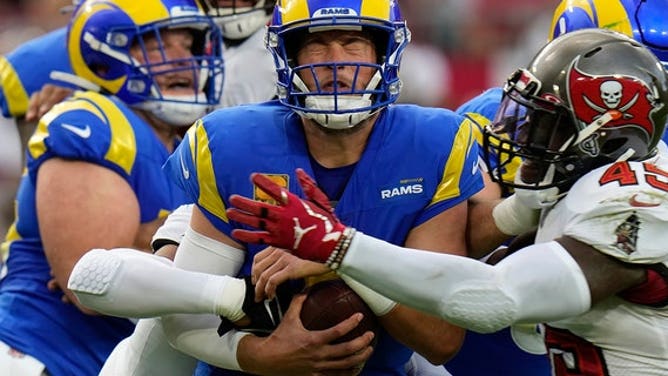 Los Angeles Rams quarterback Matthew Stafford, #9, is sacked by Tampa Bay Buccaneers linebacker Devin White, #45, during the first half of an NFL football game between the Los Angeles Rams and Tampa Bay Buccaneers, Sunday, Nov. 6, 2022, in Tampa, Florida.