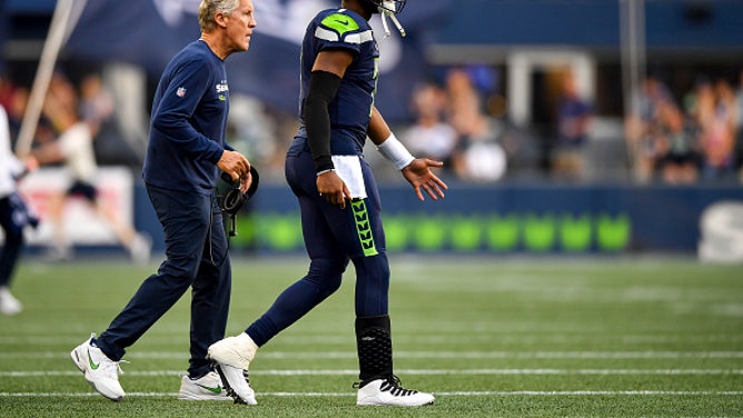 Pete Carroll and Geno Smith