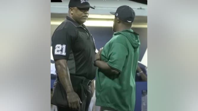 MVSU coach Milton Barney argues with umpire Reggie Drummer.