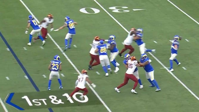 Washington Commanders rush five against eight Los Angeles Rams blockers.