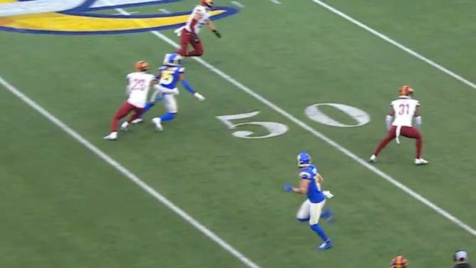 Washington Commanders elect to triple-cover Los Angeles Rams wide receiver Tutu Atwell and leave Cooper Kupp wide open.