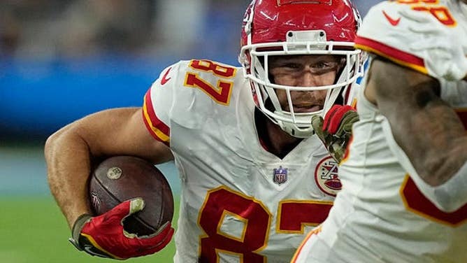 Travis Kelce, #87 of the Kansas City Chiefs, runs the ball after a catch during the second half in the game against the Los Angles Chargers at SoFi Stadium on Nov. 20, 2022 in Inglewood, California.