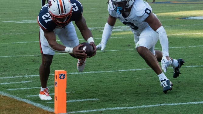 Auburn Tigers RB Jarquez Hunter dives for a TD against the Penn State Nittany Lions at Jordan-Hare Stadium in Alabama.