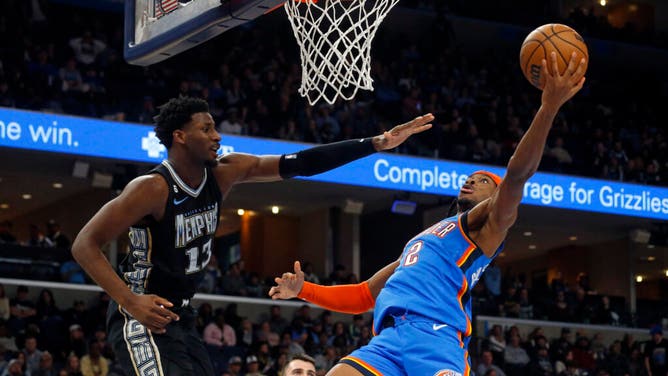 Oklahoma City Thunder PG Shai Gilgeous-Alexander goes to the cup on Grizzlies PF Jaren Jackson Jr. at FedExForum in Memphis, Tennessee.
