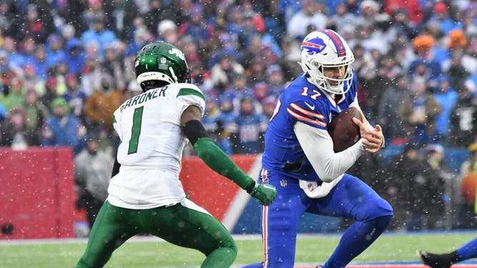 Bills QB Josh Allen scrambles past New York Jets CB Sauce Gardner at Highmark Stadium.