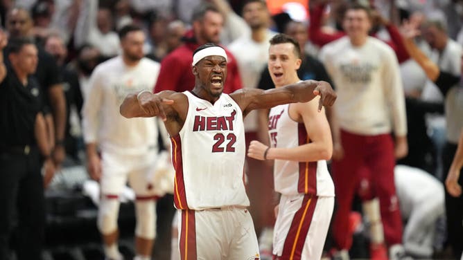 Heat wing Jimmy Butler celebrates after making a shot vs. the Bucks in Game 4 of the 2023 NBA Playoffs at Kaseya Center in Miami.