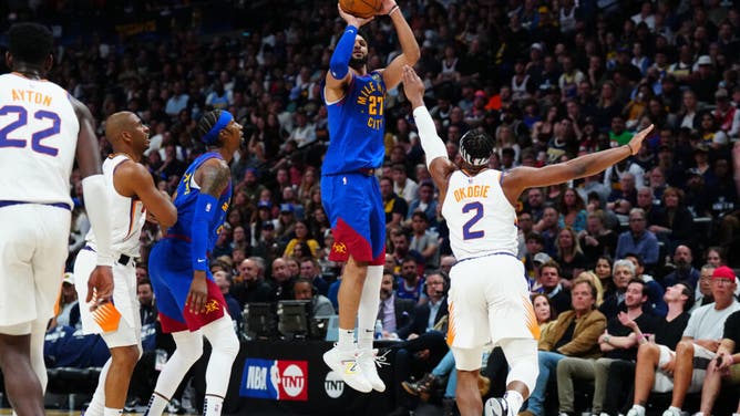Murray shoots a contested 3 over Suns wing Josh Okogie during Game 1 of the 2023 NBA Playoffs at Ball Arena.