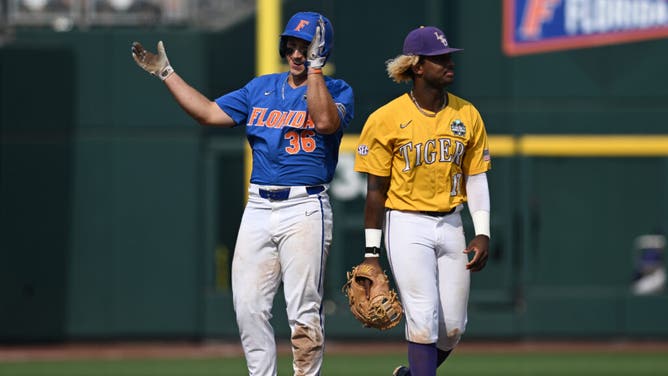 Florida CF Wyatt Langford celebrates hitting a double in Game 2 of the 2023 Men's College World Series at Charles Schwab Field.