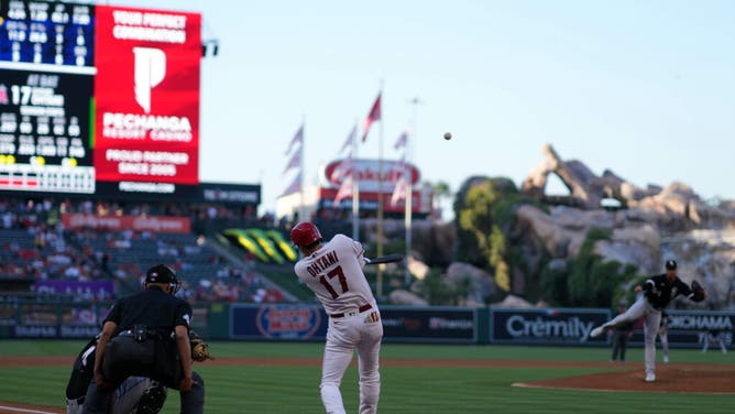 Shohei Ohtani follows through on a solo home run in the 1st inning vs. the Chicago White Sox at Angel Stadium in Anaheim, California.