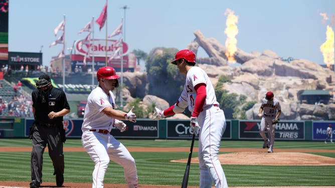 Mike Trout celebrates with Ohtani after hitting a solo HR vs. Arizona Diamondbacks at Angel Stadium in Anaheim.