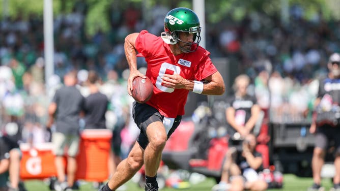 Aaron Rodgers participates in drills during the New York Jets Training Camp at Atlantic Health Jets Training Center.