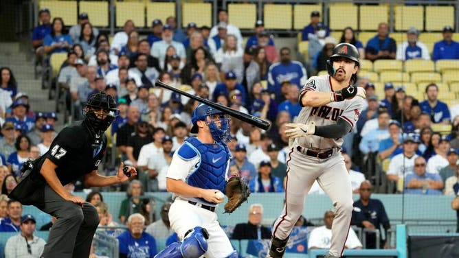 Arizona Diamondbacks OF Corbin Carroll walks against the LA Dodgers during Game 2 of the NLDS at Dodger Stadium.