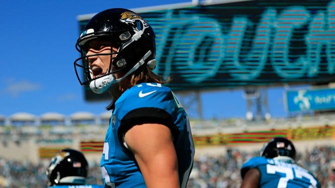 Jaguars QB Trevor Lawrence celebrates his passing TD score to Jaguars WR Christian Kirk vs. the Indianapolis Colts at EverBank Stadium in Jacksonville, Florida.