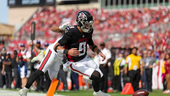 Buccaneers safety Antoine Winfield Jr. forces a fumble by Atlanta Falcons QB Desmond Ridder at the goal-line at Raymond James Stadium in Tampa Bay, Florida.