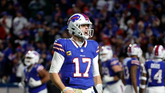 Buffalo Bills QB Josh Allen celebrates his 81-yard TD pass to WR Khalil Shakir vs. the New York Jets at Highmark Stadium in Orchard Park, New York.