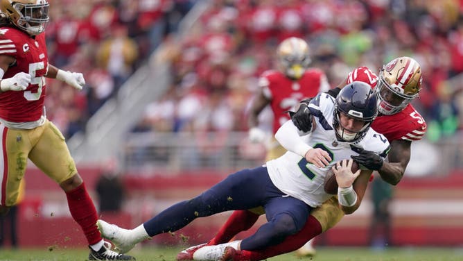 San Francisco 49ers LB Dre Greenlaw sacks Seattle Seahawks QB Drew Lock at Levi's Stadium in Santa Clara, California.