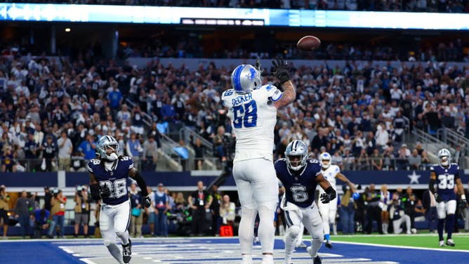 Detroit Lions offensive tackle Taylor Decker catches a two-point conversion that was overturned by a penalty during the fourth quarter against the Dallas Cowboys at AT&T Stadium.